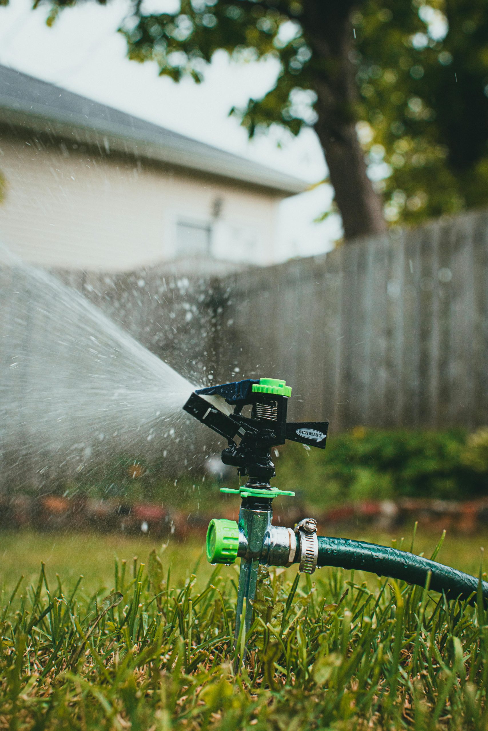 Residential lawn sprinkler, automatic turf watering system and backyard irrigation setup